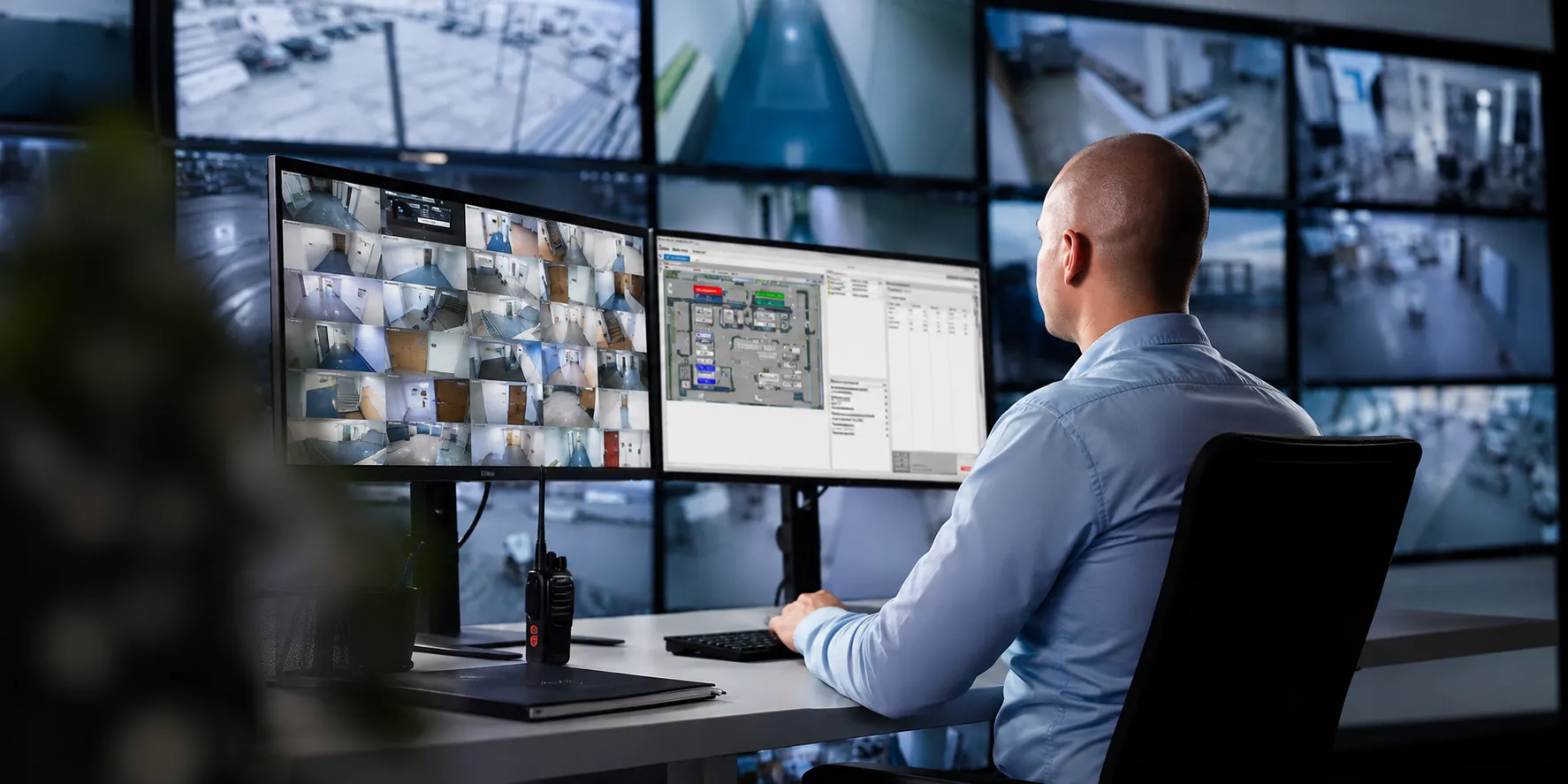 Security operator monitoring live CCTV feeds and access control systems
